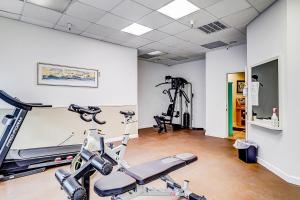 a gym with two exercise bikes in a room at Spa on Port Royal Sound 2101 in Hilton Head Island