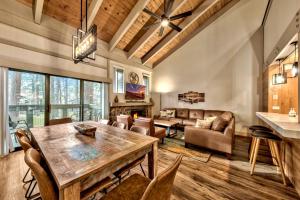 a large living room with a table and chairs at Lakeland Village 426 - Lakeland Luxury - Remodeled in South Lake Tahoe