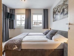 Posteľ alebo postele v izbe v ubytovaní Luxury Tauern Suite Walchen Kaprun 1
