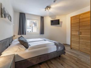 Posteľ alebo postele v izbe v ubytovaní Luxury Tauern Suite Walchen Kaprun 1