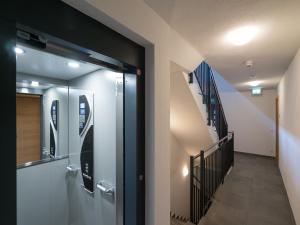 Televízia a/alebo spoločenská miestnosť v ubytovaní Luxury Tauern Suite Walchen Kaprun 1