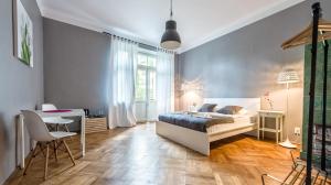 Posteľ alebo postele v izbe v ubytovaní Sereno Apartments