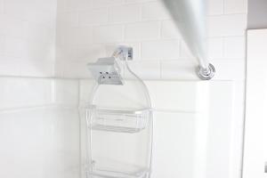 a bathroom with a shower with a faucet at Location, Location, Location-Immaculate 1 Bedroom Suite in Victoria +92 photos