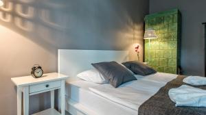 Posteľ alebo postele v izbe v ubytovaní Sereno Apartments