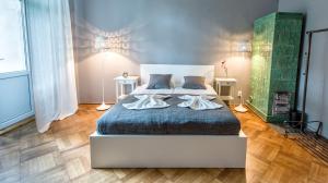 Posteľ alebo postele v izbe v ubytovaní Sereno Apartments