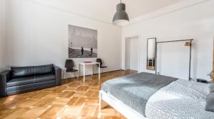 Posteľ alebo postele v izbe v ubytovaní Sereno Apartments