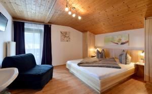 Postel nebo postele na pokoji v ubytování Haus Bianca