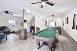 a living room with a pool table in it at Casa di Montagna/5BR/3Bath/NearResorts/PetsAllowed in Pocono Lake