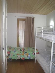 Posteľ alebo postele v izbe v ubytovaní House Arianna