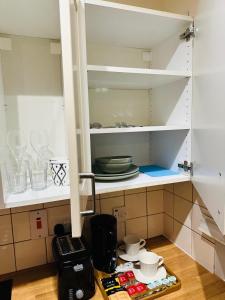 Chic Urban Retreat tesisinde mutfak veya mini mutfak