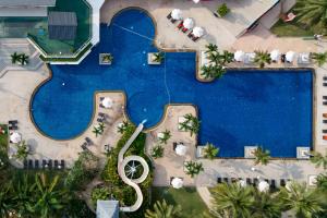 an overhead view of a swimming pool at a resort at Radisson Resort & Spa Hua Hin in Cha Am