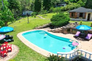 Gallery image of Los de Arriba Hotel Cabaña familiar con piscina en Calima in Darién