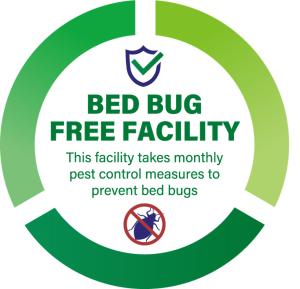 a green sign that reads bed bug free facility at Yado Hachiemon in Osaka