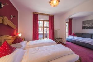 Ένα ή περισσότερα κρεβάτια σε δωμάτιο στο Hotel Gamshof