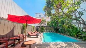 Bazén v ubytování Dusit Hotel Siem Reap nebo v jeho okolí