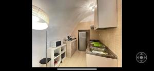 Kuchyň nebo kuchyňský kout v ubytování Apartment Maison Favola - Affitti Brevi Italia