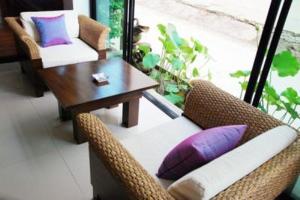 Posezení v ubytování Nicha Suite Hua Hin Hotel