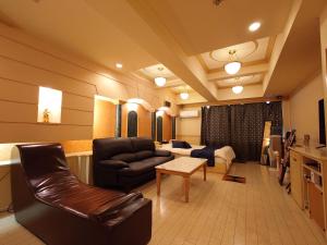 Area soggiorno di ホテル カーシュ Cache 男塾ホテルグループ