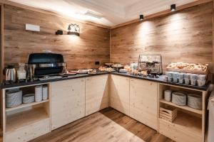 Kuchyň nebo kuchyňský kout v ubytování Hotel garni Meledrio