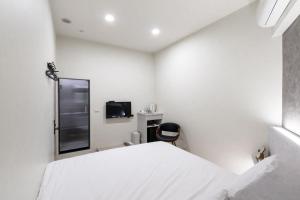 Voodi või voodid majutusasutuse hōo落雨 溫泉旅店 toas