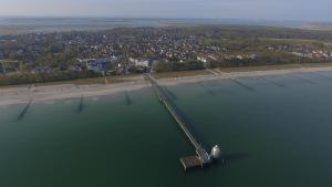 an aerial view of a dock in a body of water at ZingstUrlauber in Zingst