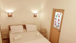 Postel nebo postele na pokoji v ubytování Sweden Inn Guesthouse