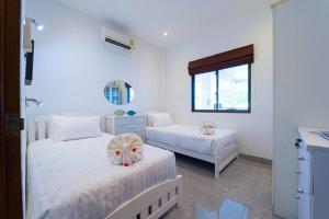 Postel nebo postele na pokoji v ubytování Private 3 Bedroom Pool Villa PV7 + 54 fotografií