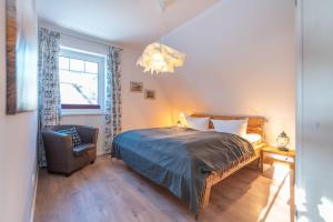 Postel nebo postele na pokoji v ubytování Ferienhaus Meerzeit