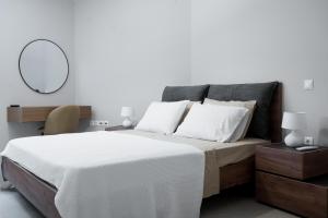 Ένα ή περισσότερα κρεβάτια σε δωμάτιο στο Meda apartments 1