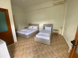 Postel nebo postele na pokoji v ubytování Guesthouse SELI