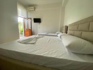 Postel nebo postele na pokoji v ubytování Guesthouse SELI