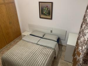 Łóżko lub łóżka w pokoju w obiekcie ALEGRIA ID110