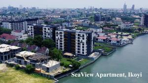 an aerial view of a city with a river and buildings at Seaview Apartment, Ikoyi in Lagos