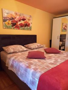 Postel nebo postele na pokoji v ubytování Apartmani Corleone
