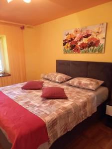 Postel nebo postele na pokoji v ubytování Apartmani Corleone