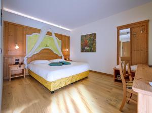 Voodi või voodid majutusasutuse Hotel Garni La Vigna - Adult Friendly toas