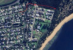 an aerial view of a residential area next to the ocean at Studio 54 Cape Woolamai in Cape Woolamai