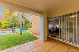 an empty house with a view of a backyard at Homely Haven in Roodepoort