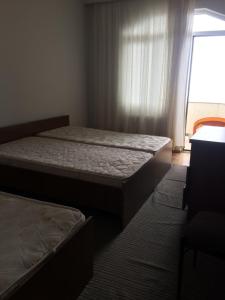 Кровать или кровати в номере Dom7