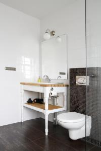 Ванна кімната в Lónsleira Apartments