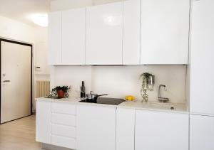 Kuchyň nebo kuchyňský kout v ubytování Holihome Curtis