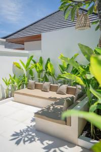 a rendering of a patio with a couch at Villa Sakura Nusa Dua in Nusa Dua