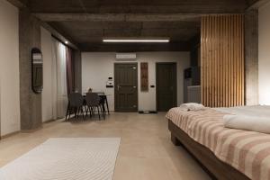Ένα ή περισσότερα κρεβάτια σε δωμάτιο στο Olive Residence