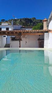 a large pool of water on top of a building at Casa Moya Villa Lujo in Alájar