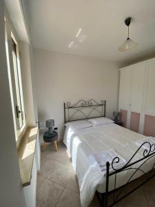 A bed or beds in a room at Villa Laurus