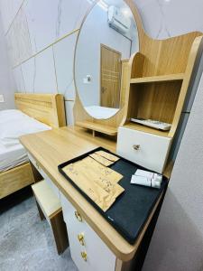 Postel nebo postele na pokoji v ubytování TONY HOMESTAY CẦN THƠ