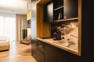 a kitchen with a sink and a counter at Rioca Konstanz Posto 10 in Konstanz