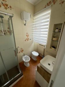 Ванная комната в Maddalena Means Home +9 фотографий