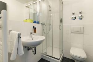 Koupelna v ubytování Max Aparthotel in Fürth + 28 fotografií