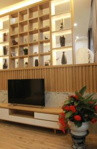 Florian Villa Dalat tesisinde bir televizyon ve/veya eğlence merkezi